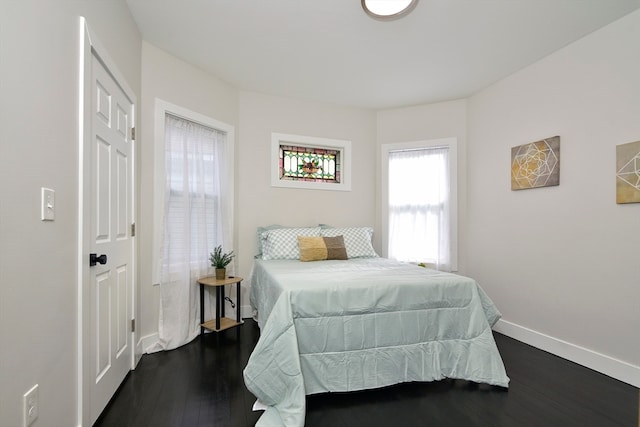 bedroom featuring dark hardwood / wood-style floors