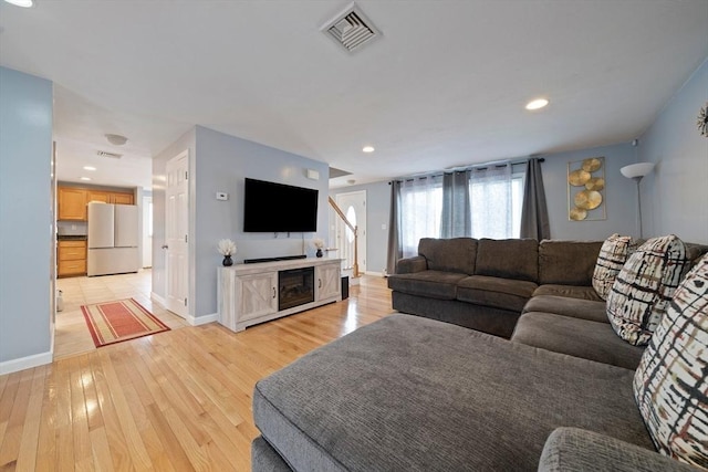 living room featuring light wood-type flooring