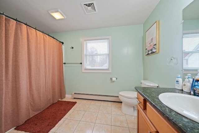 bathroom with baseboard heating, tile patterned floors, vanity, and toilet