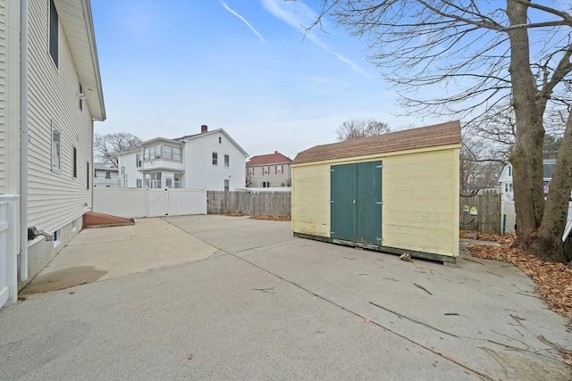 exterior space featuring a shed