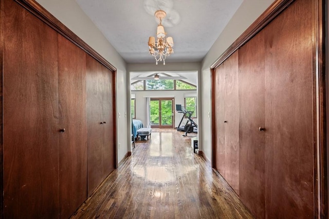 146 Field St, Taunton, MA 02780 - corridor with hardwood / wood-style floors and a chandelier