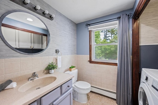 146 Field St, Taunton, MA 02780 - full bathroom featuring a baseboard heating unit, washer / clothes dryer, vanity, tile walls, and a wainscoted wall