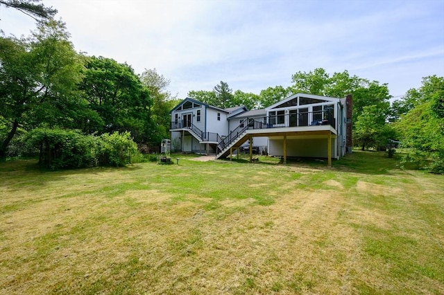146 Field St, Taunton, MA 02780 - rear view of property featuring stairs, a deck, a lawn, and dirt driveway