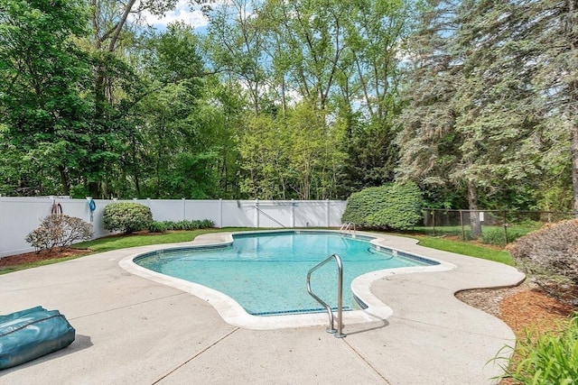 5 Washington St Unit D2, Reading, MA 01867 - view of pool with a fenced backyard and a patio area
