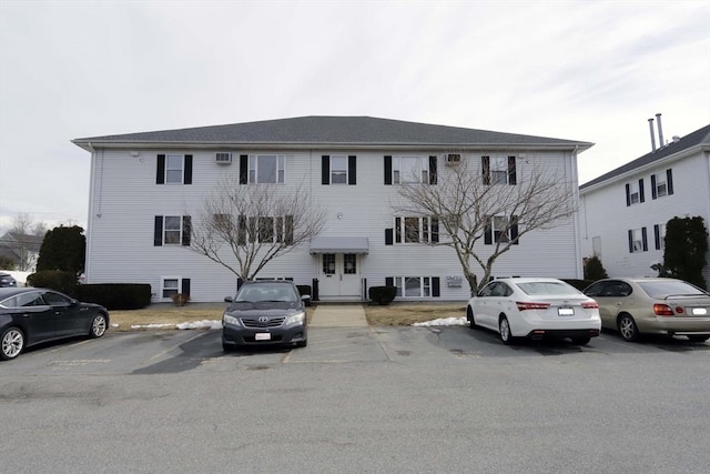 view of front of house with uncovered parking