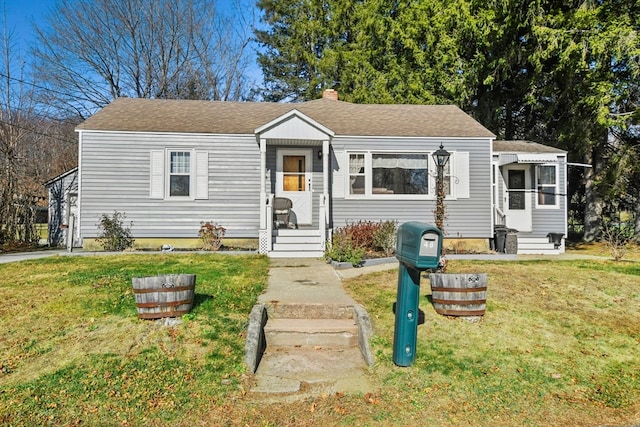 view of front of house with a front yard