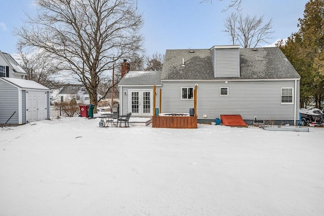 view of snow covered house