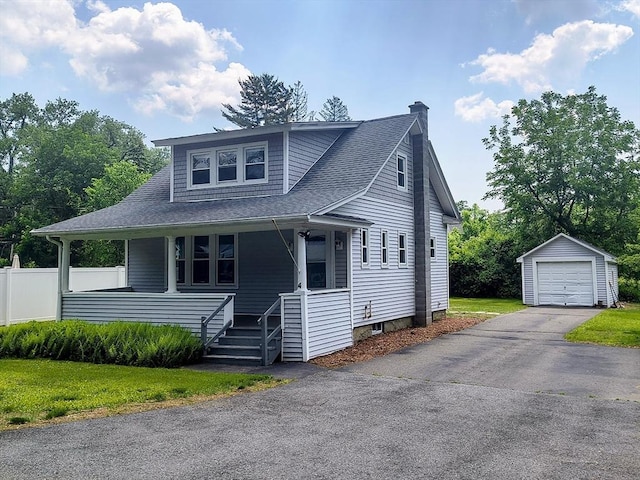 4 Aldrich Ave, Huntington, MA 01050 - view of front of property with an outbuilding, a garage, a chimney, a porch, and driveway