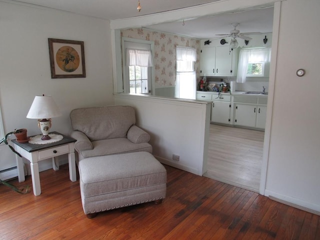 4 Aldrich Ave, Huntington, MA 01050 - sitting room featuring light wood-style floors, a ceiling fan, baseboards, and wallpapered walls