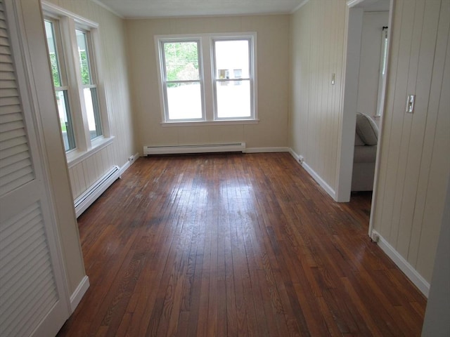 4 Aldrich Ave, Huntington, MA 01050 - unfurnished room featuring a baseboard radiator, dark wood-style flooring, healthy amount of natural light, and crown molding