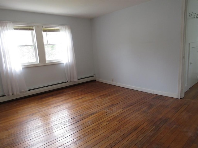 4 Aldrich Ave, Huntington, MA 01050 - spare room featuring wood-type flooring, a baseboard radiator, and baseboards
