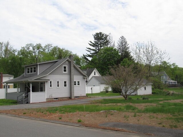 4 Aldrich Ave, Huntington, MA 01050 - view of front facade featuring a chimney