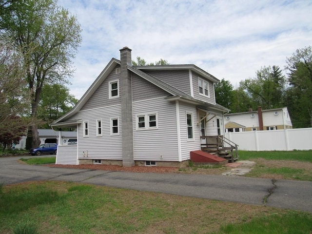 4 Aldrich Ave, Huntington, MA 01050 - view of side of property featuring a chimney
