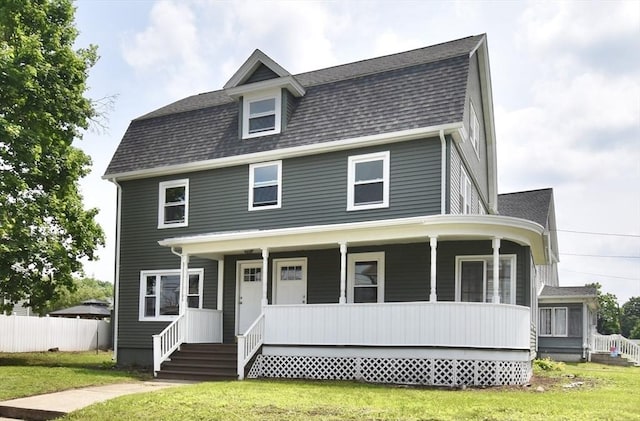 130 Center St, Ludlow, MA 01056 - view of front of property featuring covered porch and a shingled roof