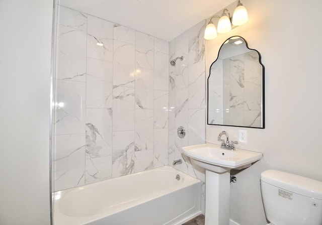 130 Center St, Ludlow, MA 01056 - full bathroom featuring shower / tub combination and toilet