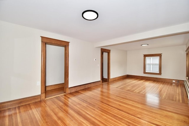 130 Center St, Ludlow, MA 01056 - spare room featuring light wood-style floors and baseboards