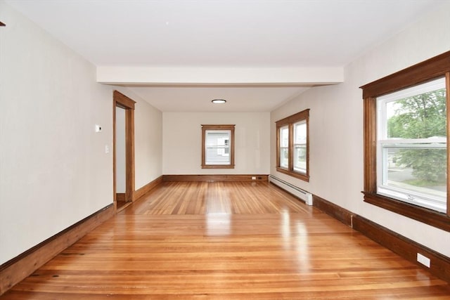 130 Center St, Ludlow, MA 01056 - spare room with a baseboard radiator, light wood-style floors, plenty of natural light, and baseboards