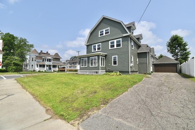 130 Center St, Ludlow, MA 01056 - view of front facade featuring a detached garage