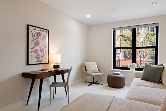 home office featuring light colored carpet