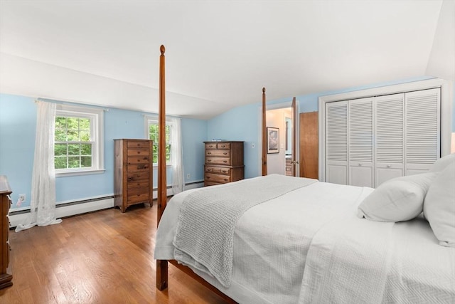 19 Birch St, Millis, MA 02054 - bedroom featuring lofted ceiling, wood finished floors, and baseboard heating