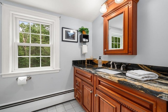 19 Birch St, Millis, MA 02054 - bathroom featuring a baseboard radiator, vanity, and tile patterned flooring
