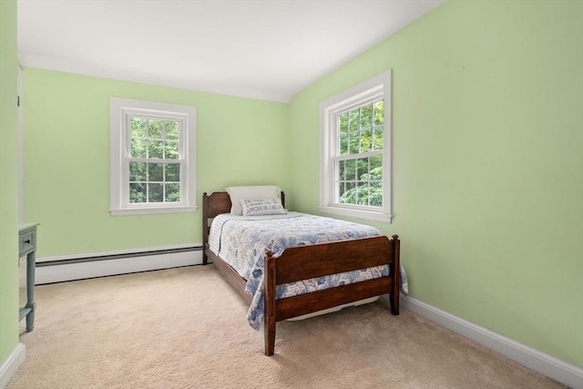 19 Birch St, Millis, MA 02054 - bedroom featuring a baseboard heating unit, multiple windows, and carpet flooring
