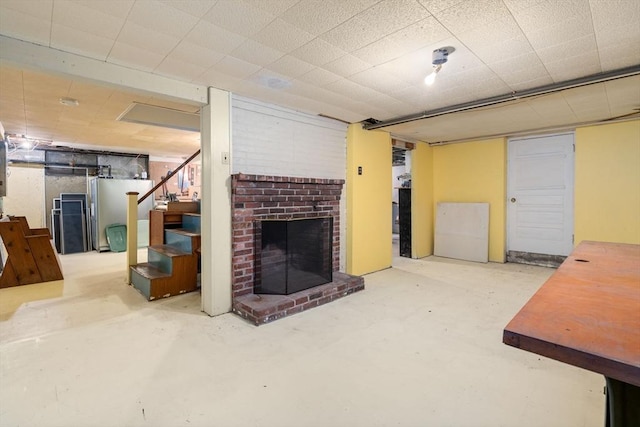 19 Birch St, Millis, MA 02054 - finished basement featuring stairs, fridge, and a fireplace
