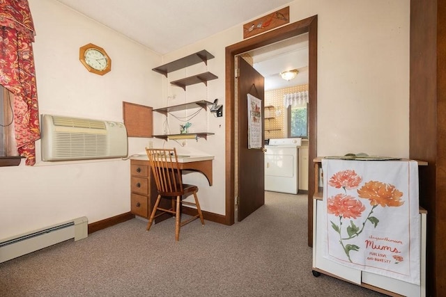 carpeted office space featuring a wall mounted air conditioner, washer / dryer, and a baseboard heating unit