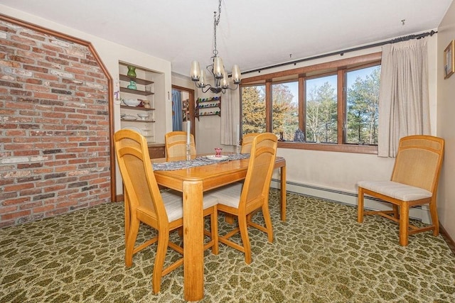 dining area featuring a chandelier and brick wall