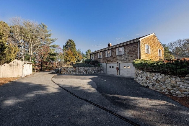 view of home's exterior featuring a garage