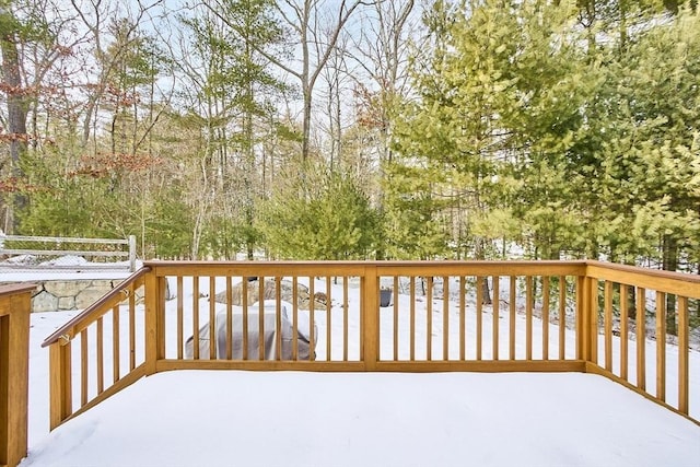 view of snow covered deck