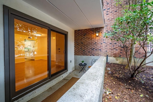 entrance to property featuring a balcony