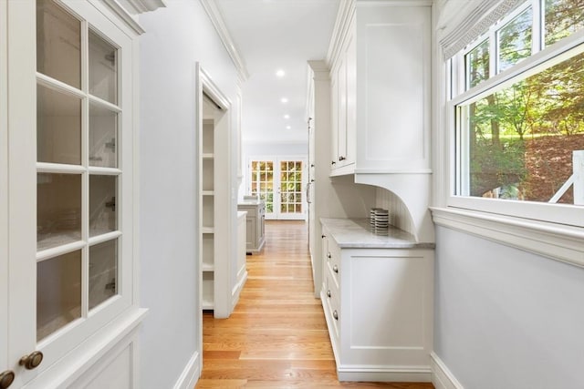 10 Eliot Rd, Lexington, MA 02421 - hallway featuring light wood finished floors, recessed lighting, and ornamental molding