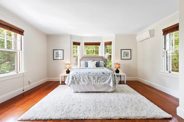 10 Eliot Rd, Lexington, MA 02421 - bedroom featuring ornamental molding, wood finished floors, and a wall unit AC