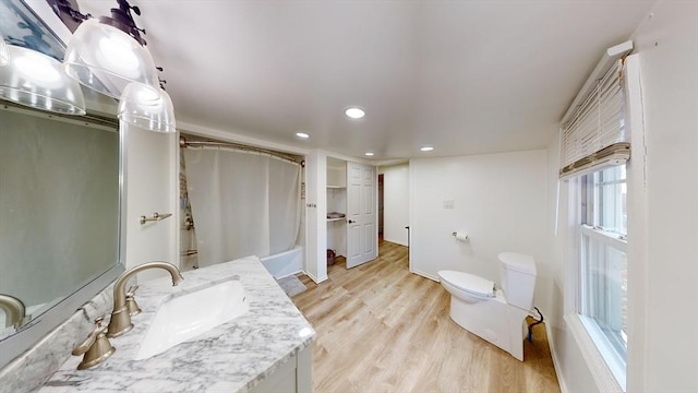 95 Prospect Street Ext, Westfield, MA 01085 - bathroom featuring hardwood / wood-style floors, vanity, toilet, and curtained shower