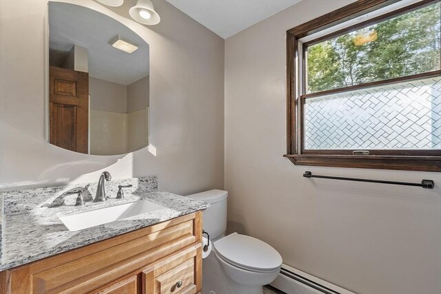 146 Lowell Rd, Pepperell, MA 01463 - bathroom with vanity and baseboard heating