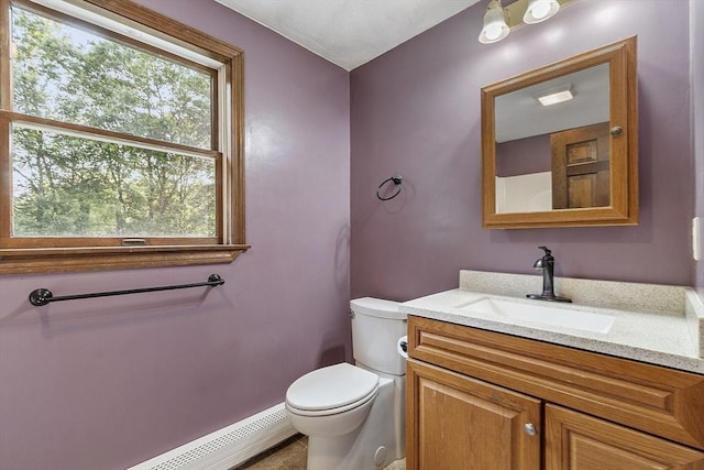 146 Lowell Rd, Pepperell, MA 01463 - bathroom featuring a baseboard radiator and vanity