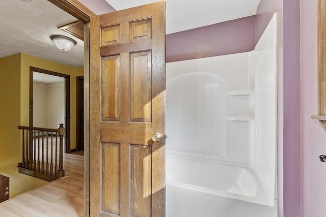 146 Lowell Rd, Pepperell, MA 01463 - full bath with wood finished floors and bathing tub / shower combination