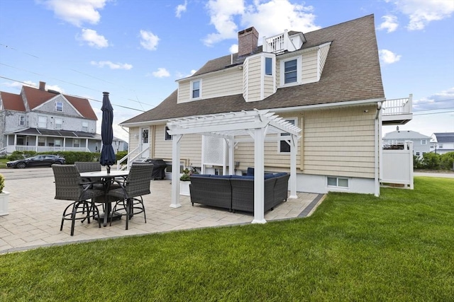 back of property featuring outdoor lounge area, a lawn, a patio, and a pergola