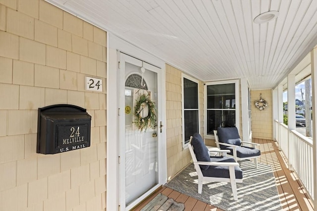 entrance to property with a porch