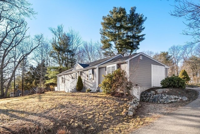 view of property exterior with fence