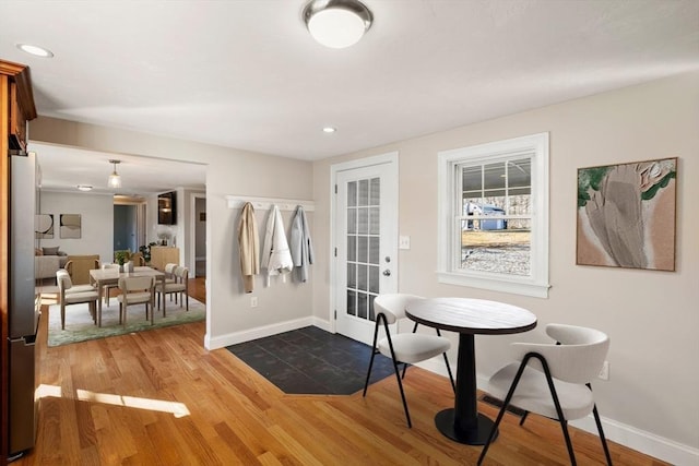 entrance foyer featuring recessed lighting, wood finished floors, and baseboards