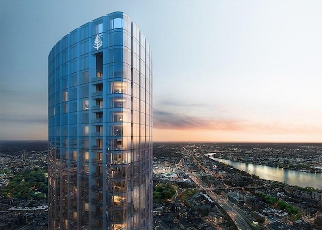 outdoor building at dusk with a water view