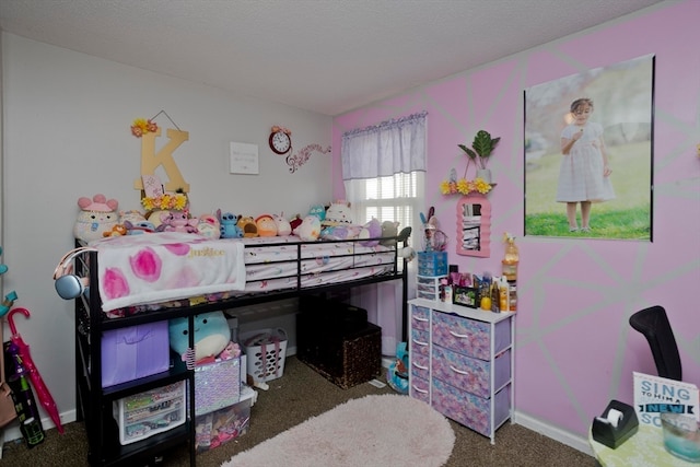 carpeted bedroom with a textured ceiling