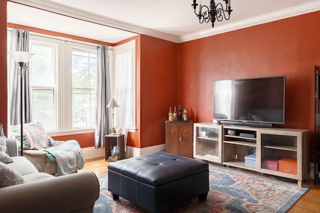 327 Lafayette St Unit 2, Salem, MA 01970 - living room featuring a chandelier, wood finished floors, and crown molding