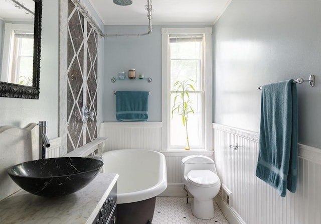 327 Lafayette St Unit 2, Salem, MA 01970 - full bathroom with a wainscoted wall, vanity, plenty of natural light, crown molding, and a soaking tub