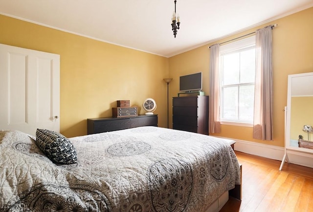 327 Lafayette St Unit 2, Salem, MA 01970 - bedroom featuring wood finished floors and ornamental molding