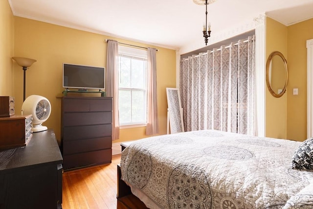 327 Lafayette St Unit 2, Salem, MA 01970 - bedroom with wood finished floors and crown molding