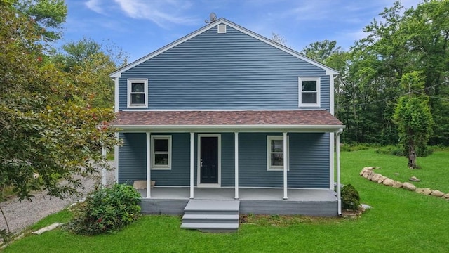 1030 Oak St, Dighton, MA 02764 - back of house featuring a porch, a lawn, and a shingled roof
