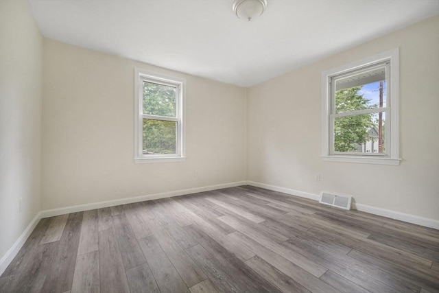 1030 Oak St, Dighton, MA 02764 - unfurnished room featuring healthy amount of natural light and wood finished floors